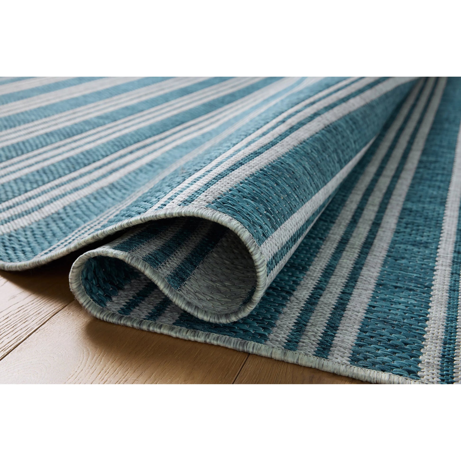 Easton ESN-04 Outdoor Rug by Loloi in teal, fog. Made from 100% polypropylene in a unique style.