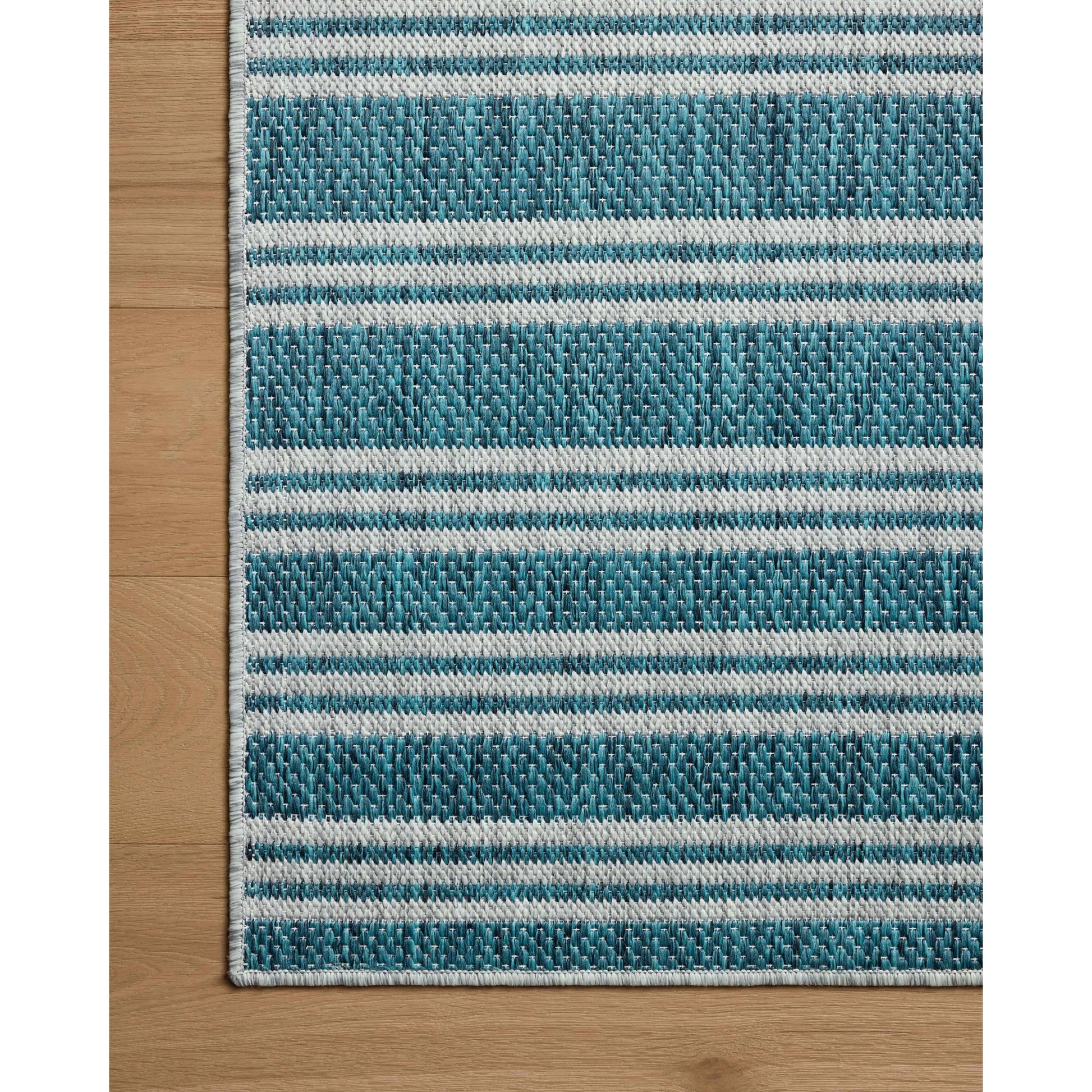 Easton ESN-04 Outdoor Rug by Loloi in teal, fog. Made from 100% polypropylene in a unique style.
