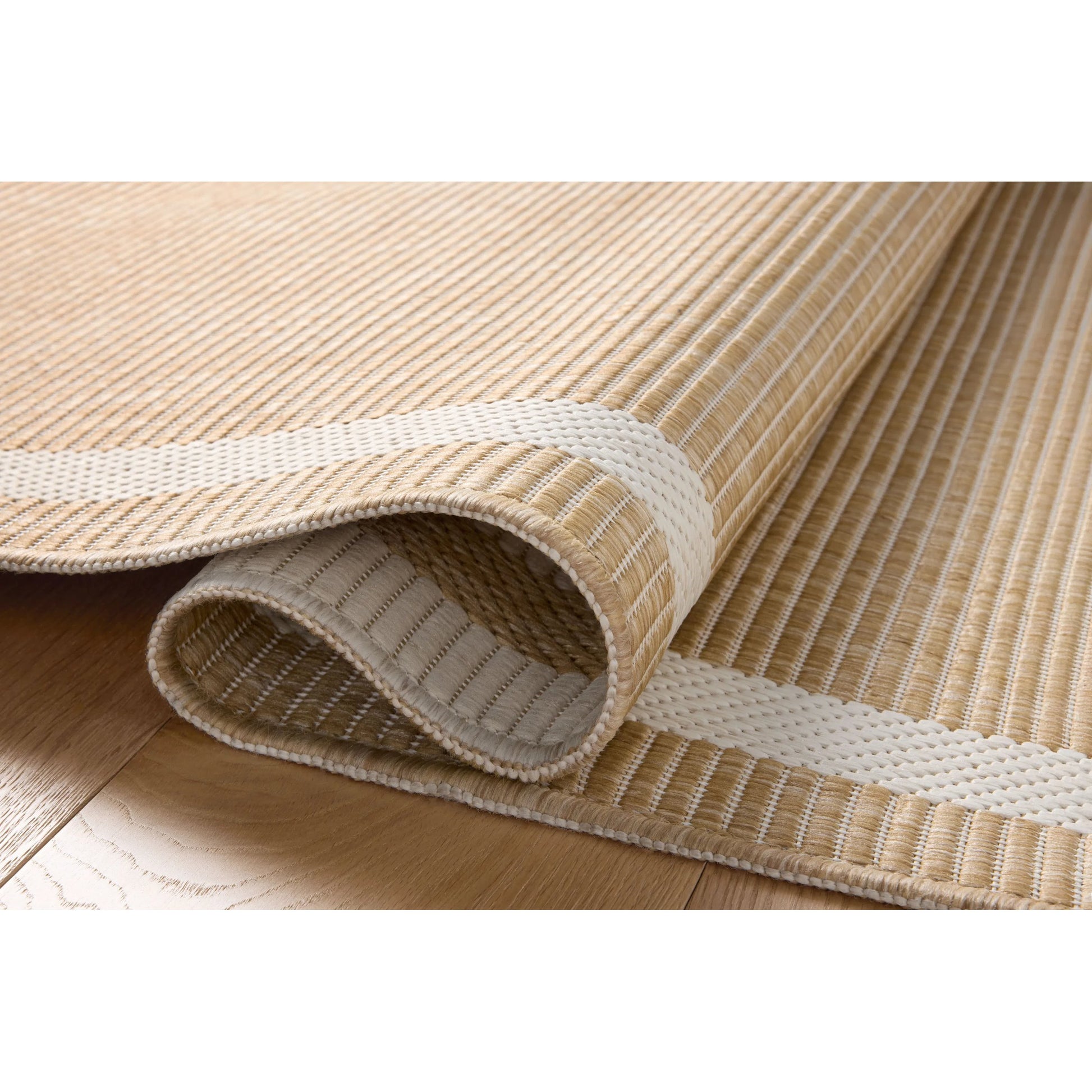 Easton ESN-05 Outdoor Rug by Loloi in wheat, ivory. Made from 100% polypropylene in a unique style.