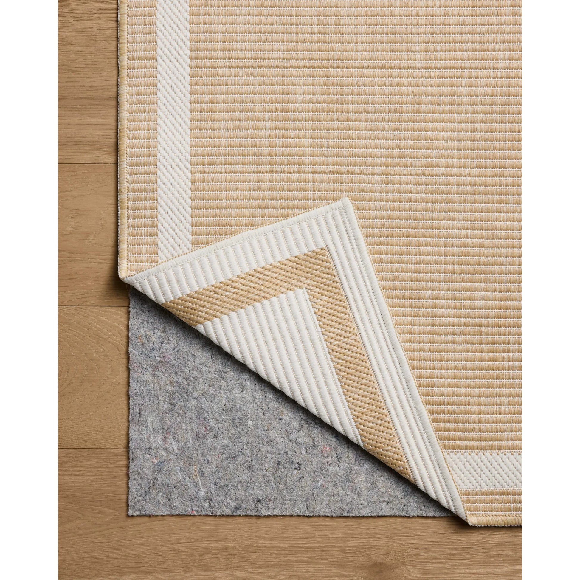 Easton ESN-05 Outdoor Rug by Loloi in wheat, ivory. Made from 100% polypropylene in a unique style.