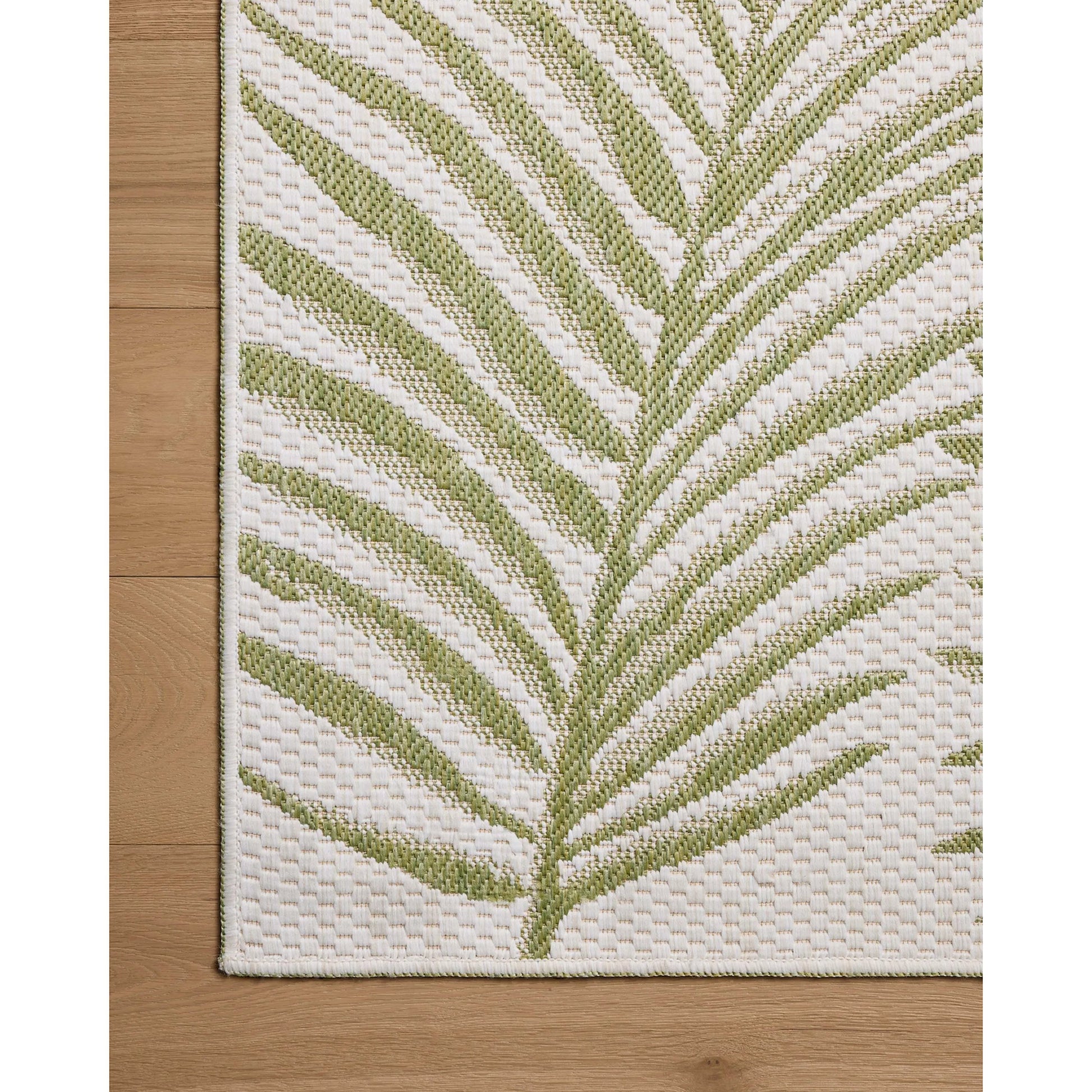 Easton ESN-06 Outdoor Rug by Loloi in ivory, green. Made from 100% polypropylene in a unique style.