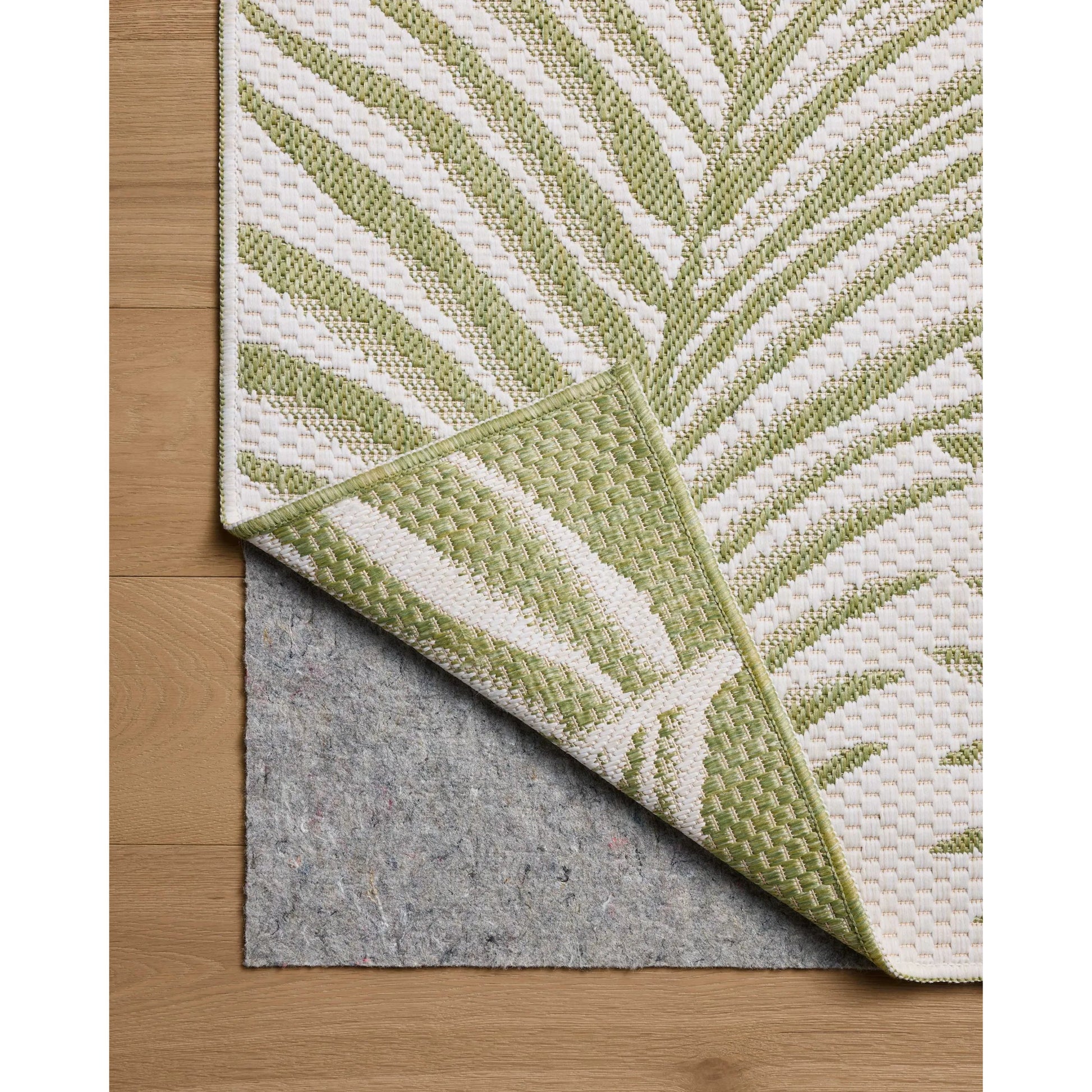 Easton ESN-06 Outdoor Rug by Loloi in ivory, green. Made from 100% polypropylene in a unique style.