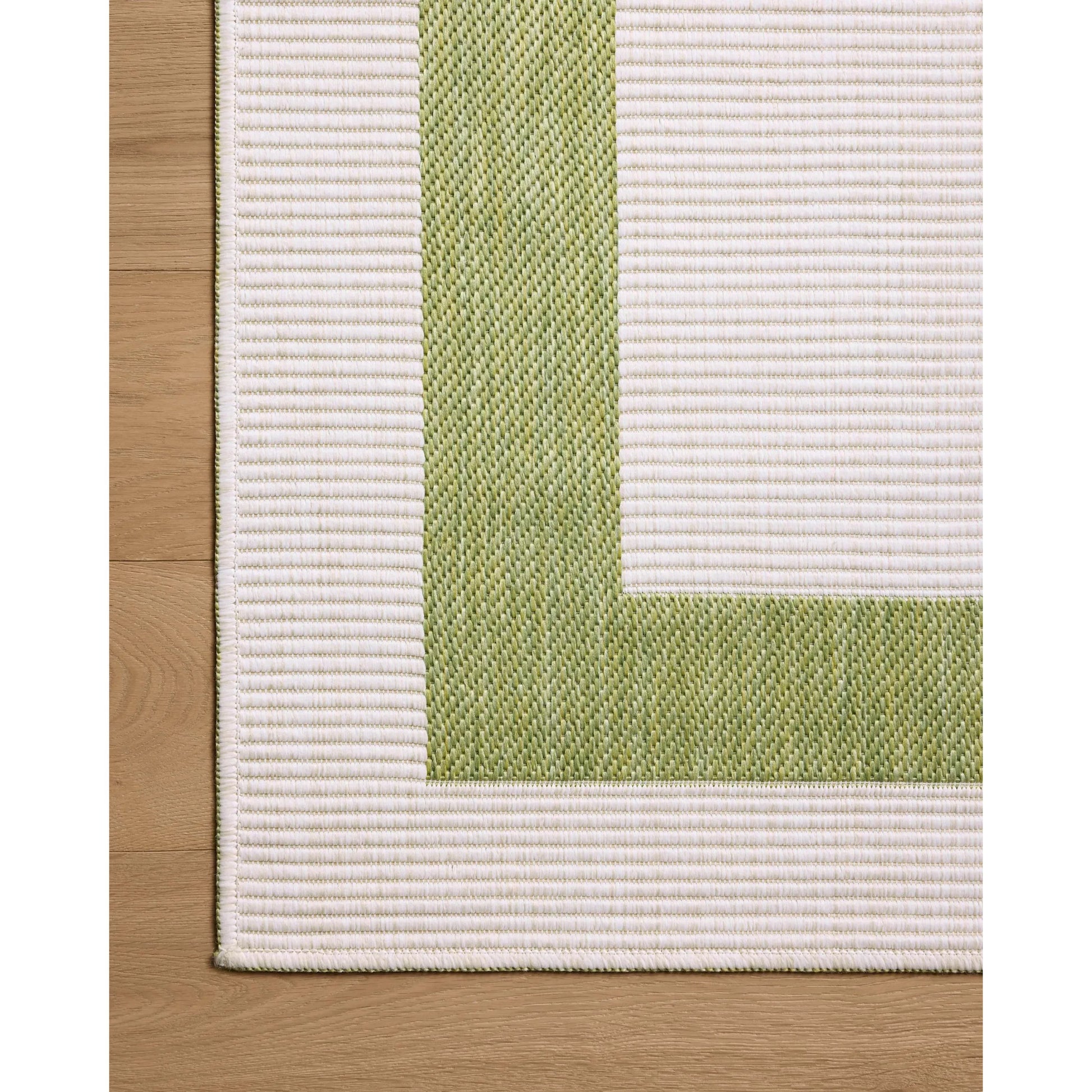 Easton ESN-07 Outdoor Rug by Loloi in green, ivory. Made from 100% polypropylene in a unique style.