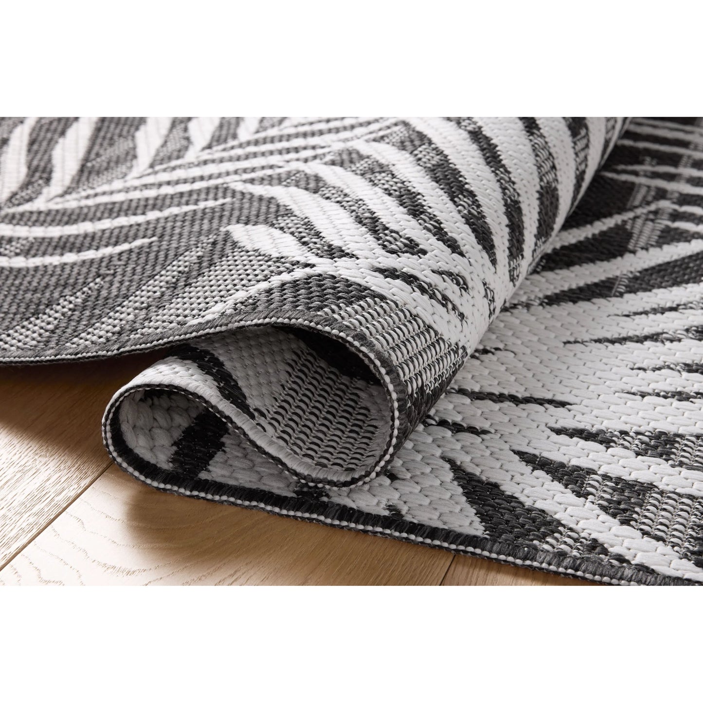 003 SI-2332310,SI-2332311,SI-2332312,SI-2332313,SI-2332314,SI-2332315,SI-2332316 | Closeup | Easton ESN-09 Outdoor Rug by Loloi in ivory, onyx. Made from 100% polypropylene in a unique style.