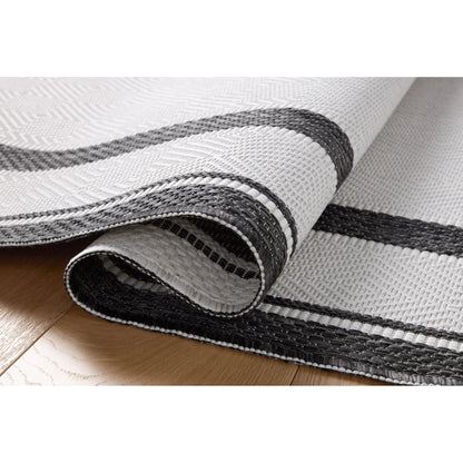 Easton ESN-11 Outdoor Rug by Loloi in onyx, ivory. Made from 100% polypropylene in a unique style.