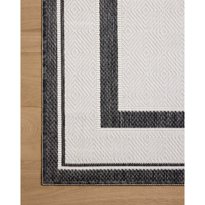 Easton ESN-11 Outdoor Rug by Loloi in onyx, ivory. Made from 100% polypropylene in a unique style.