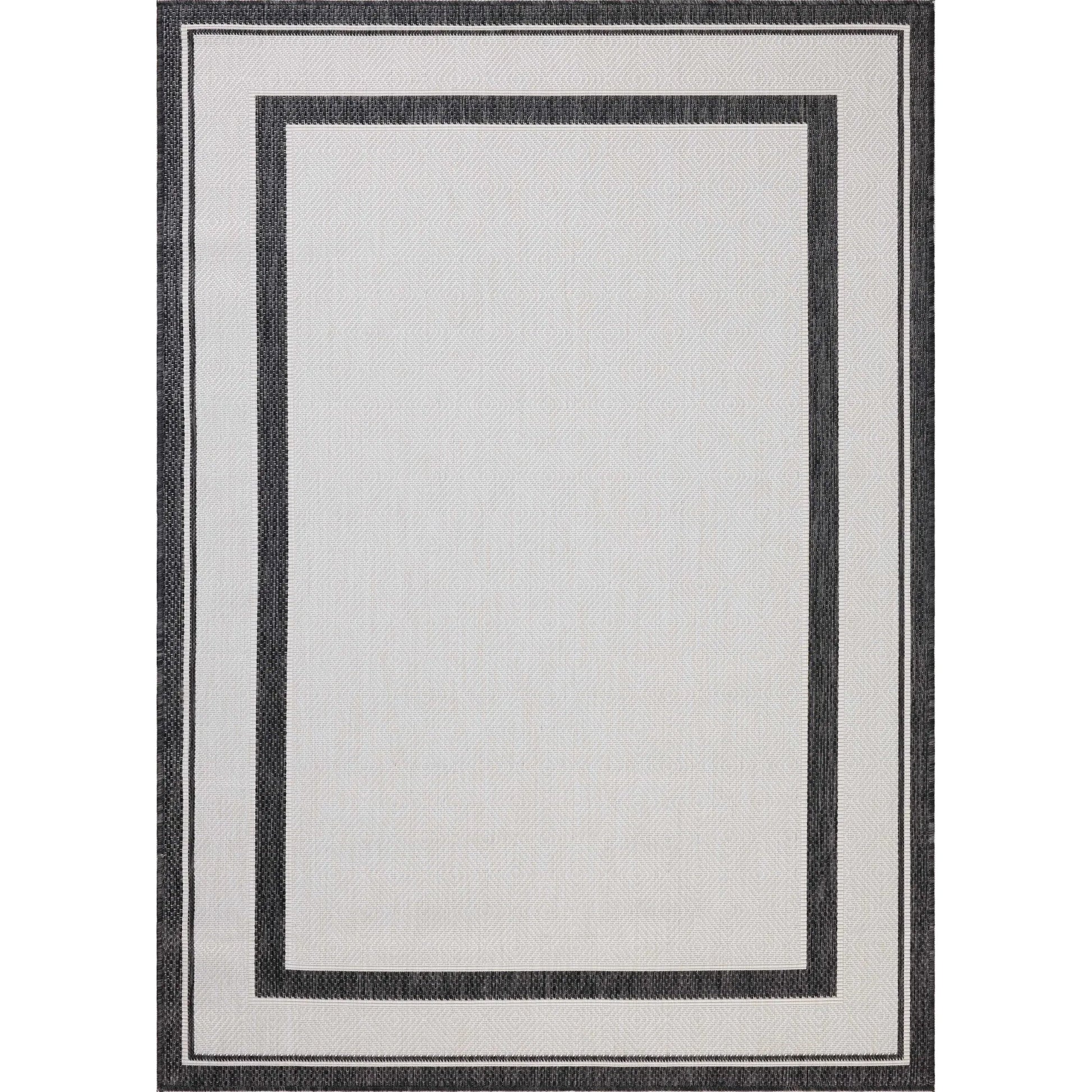 Easton ESN-11 Outdoor Rug by Loloi in onyx, ivory. Made from 100% polypropylene in a unique style.