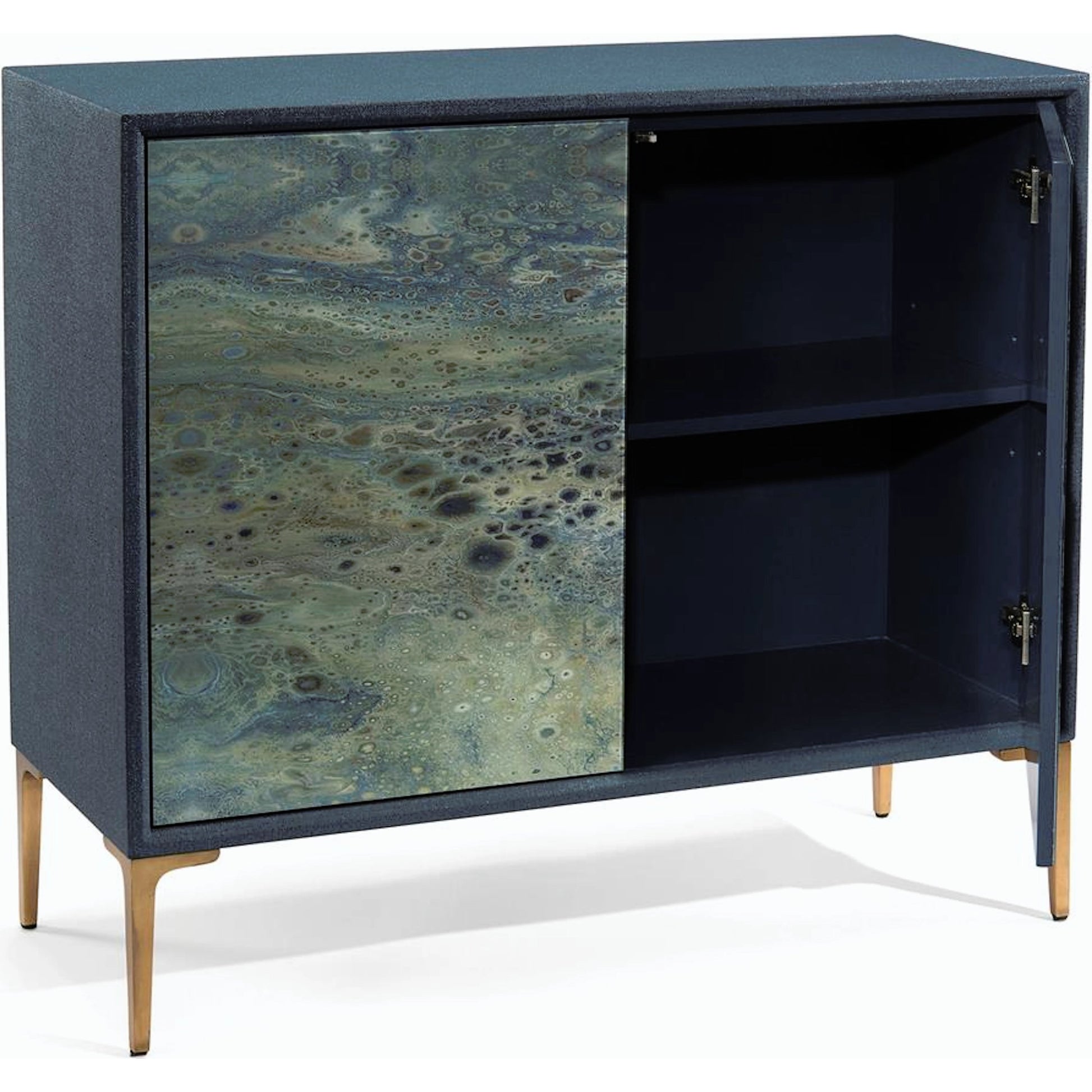 Shaye Rawson's Pavo Cabinet by John-Richard in indigo. Made from glass, metal in a coastal style.