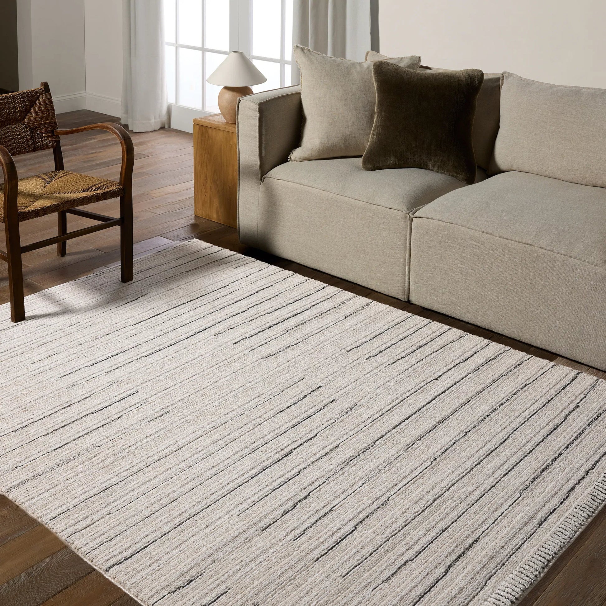 Eva EVA02 Rug by Jaipur Living in ivory, black. Made from 100% polyester in a unique style.