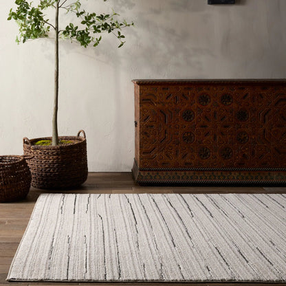 Eva EVA02 Rug by Jaipur Living in ivory, black. Made from 100% polyester in a unique style.
