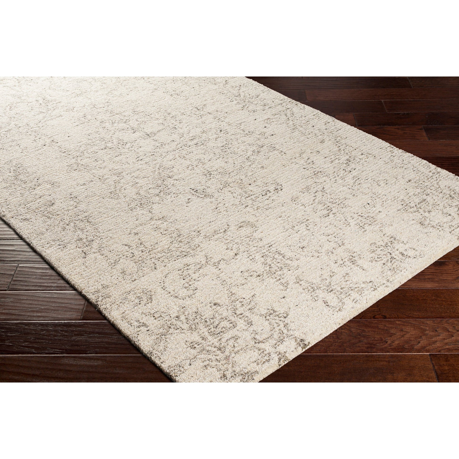 Evolution Rug by Surya in gray, charcoal, light beige, cream. Made from 70% wool, 30% viscose in a traditional style.