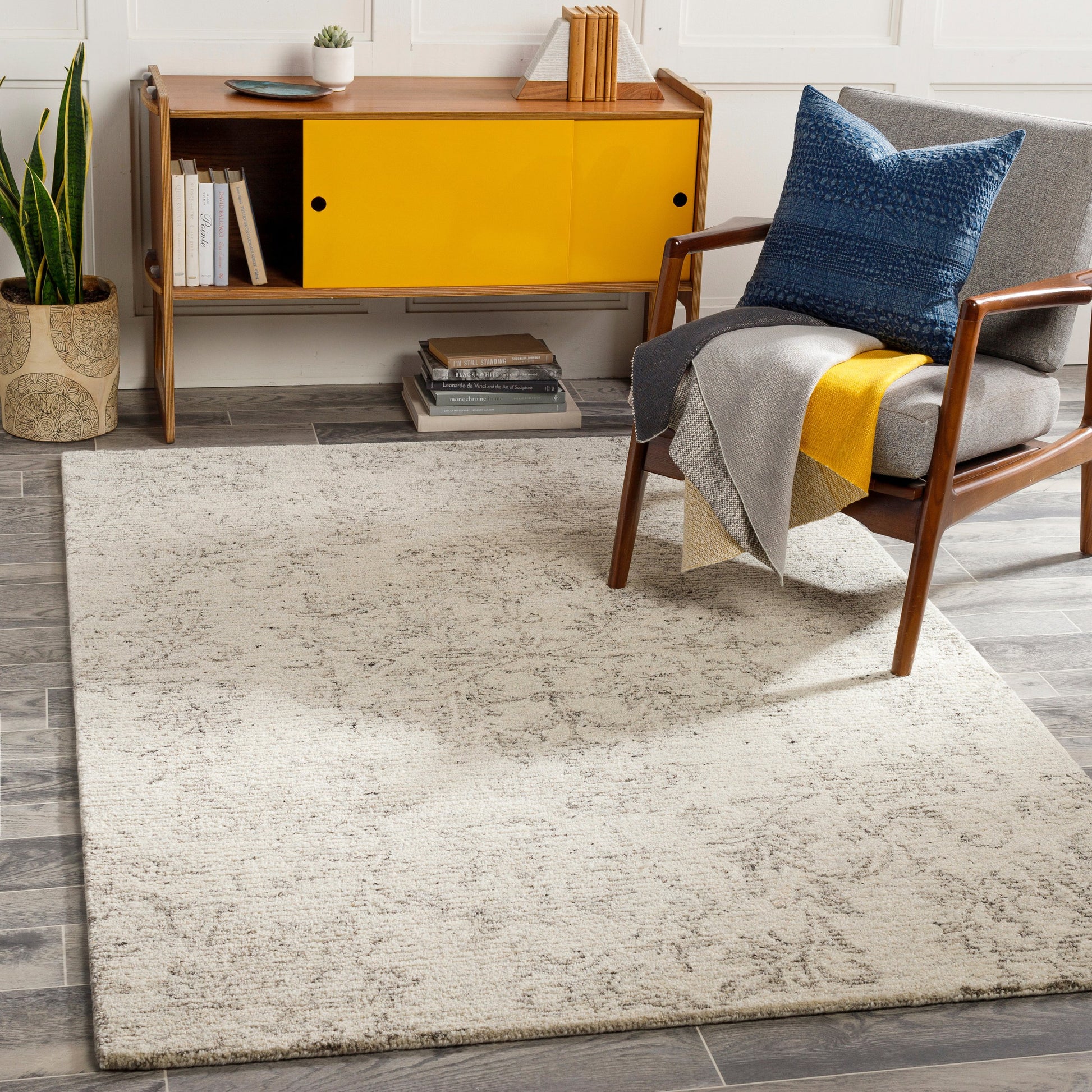 Evolution Rug by Surya in gray, charcoal, light beige, cream. Made from 70% wool, 30% viscose in a traditional style.