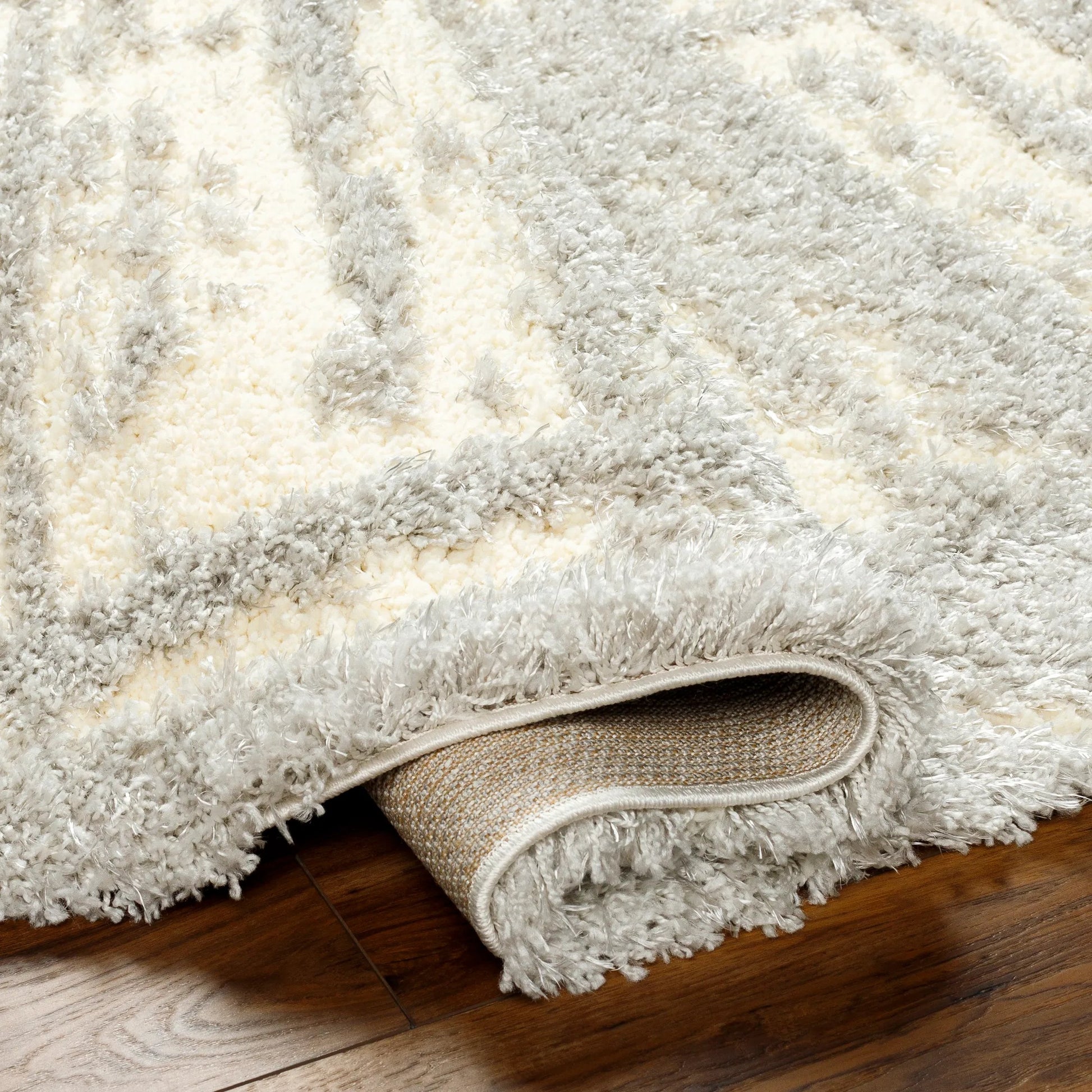 Everton Plus Area Rug by Livabliss in light gray, gray. Made from main: 51% polyester, main: 49% polypropylene in a unique style.