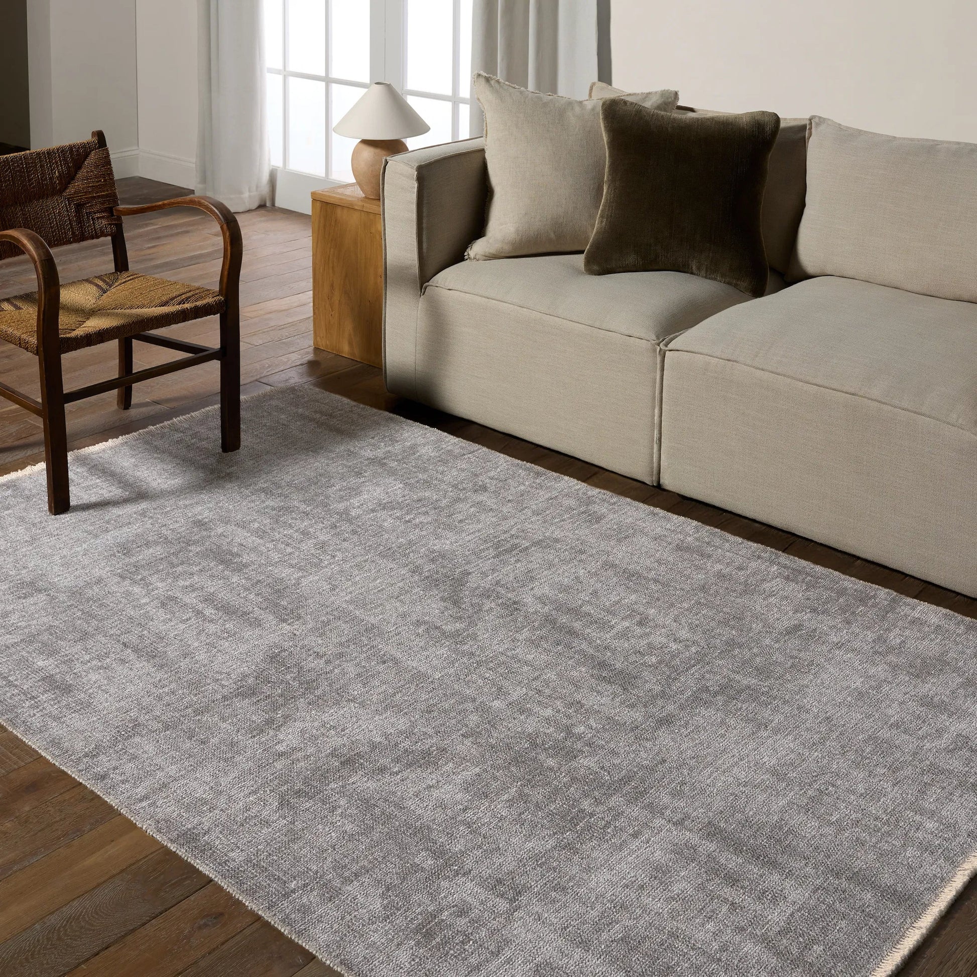 Everette EVR03 Rug by Jaipur Living in light gray, taupe. Made from 100% polyester in a unique style.