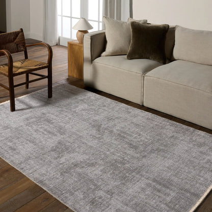Everette EVR03 Rug by Jaipur Living in light gray, taupe. Made from 100% polyester in a unique style.