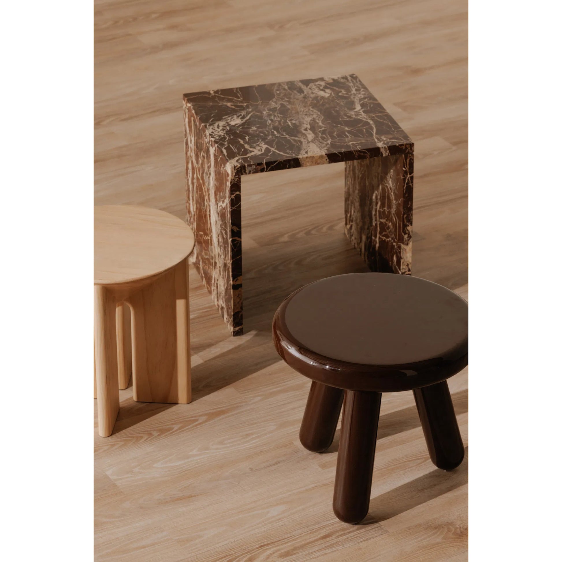 Joy Accent Table by Moe's Home Collection. Made from mdf with high, gloss lacquer, rubber wood legs, metal plates in a eclectic & global style.