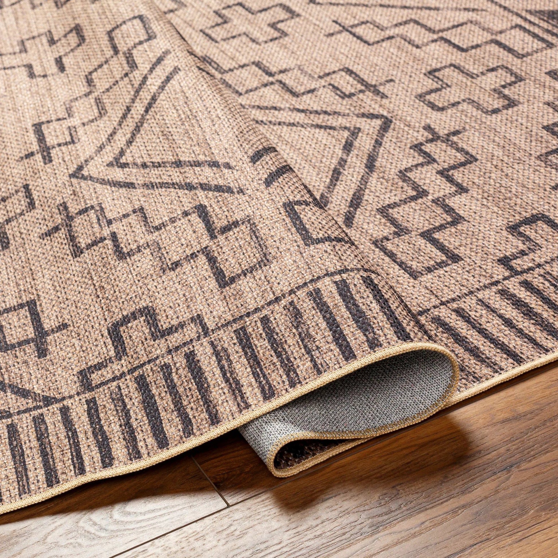 Ez Jute Rug1111 by Livabliss in light brown, black, beige. Made from main: 100% recycled material in a traditional style.
