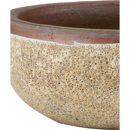 Lyra Beige Planter by Currey and Company in reactive cream. Made from ceramic in a modern style.