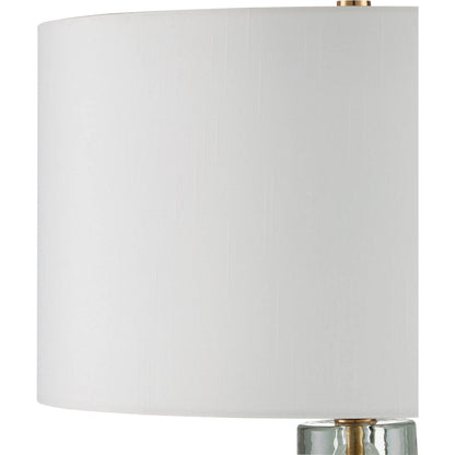 Mystras Table Lamp by Currey and Company in clear, antique brass. Made from cast glass, iron in a modern style.