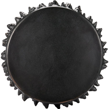Baltz Accent Table by Currey and Company in black. Made from ceramic in a unique style.
