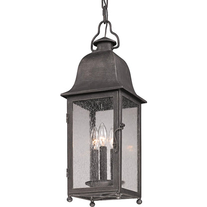 Larchmont Hanging Lantern by Troy in aged pewter. Made from hand forged iron in a traditional style.