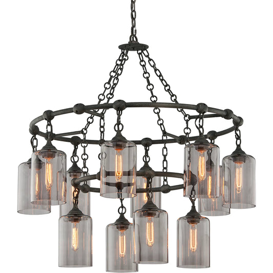 Gotham 12-Light Chandelier by Troy in aged pewter. Made from hand worked iron in a unique style.