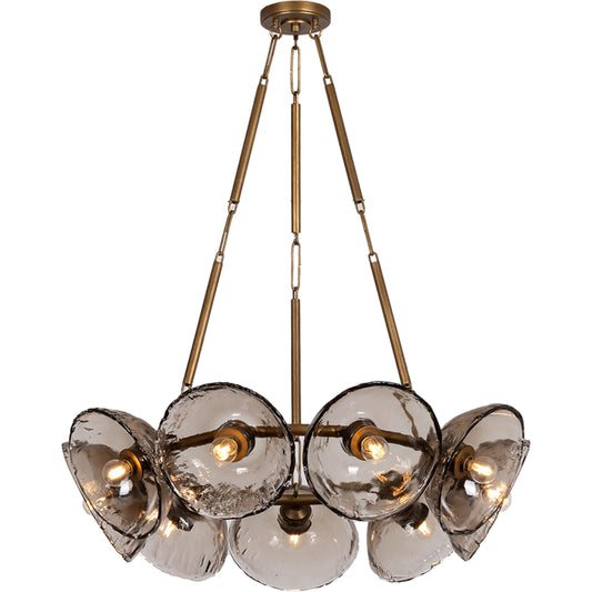 Diego Chandelier by Troy in patina gold leaf. Made from glass, clear cast glass in a unique style.