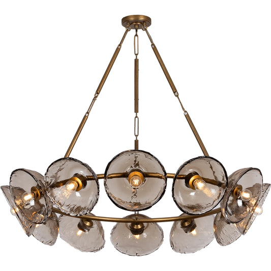 Diego Chandelier by Troy in patina gold leaf. Made from glass, clear cast glass in a unique style.