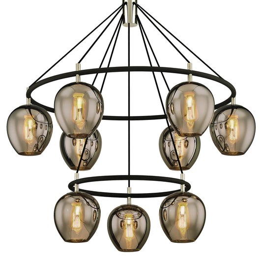 Iliad Chandelier by Troy in carbide blk, pol nickel. Made from hand worked iron in a modern style.