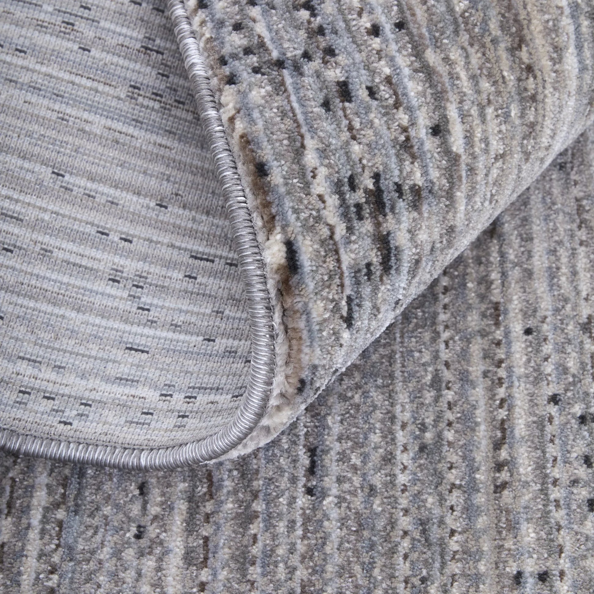 Deja Solid Rug - DJA39PJF by Feizy. Made from polypropylene, polyester in a unique style.