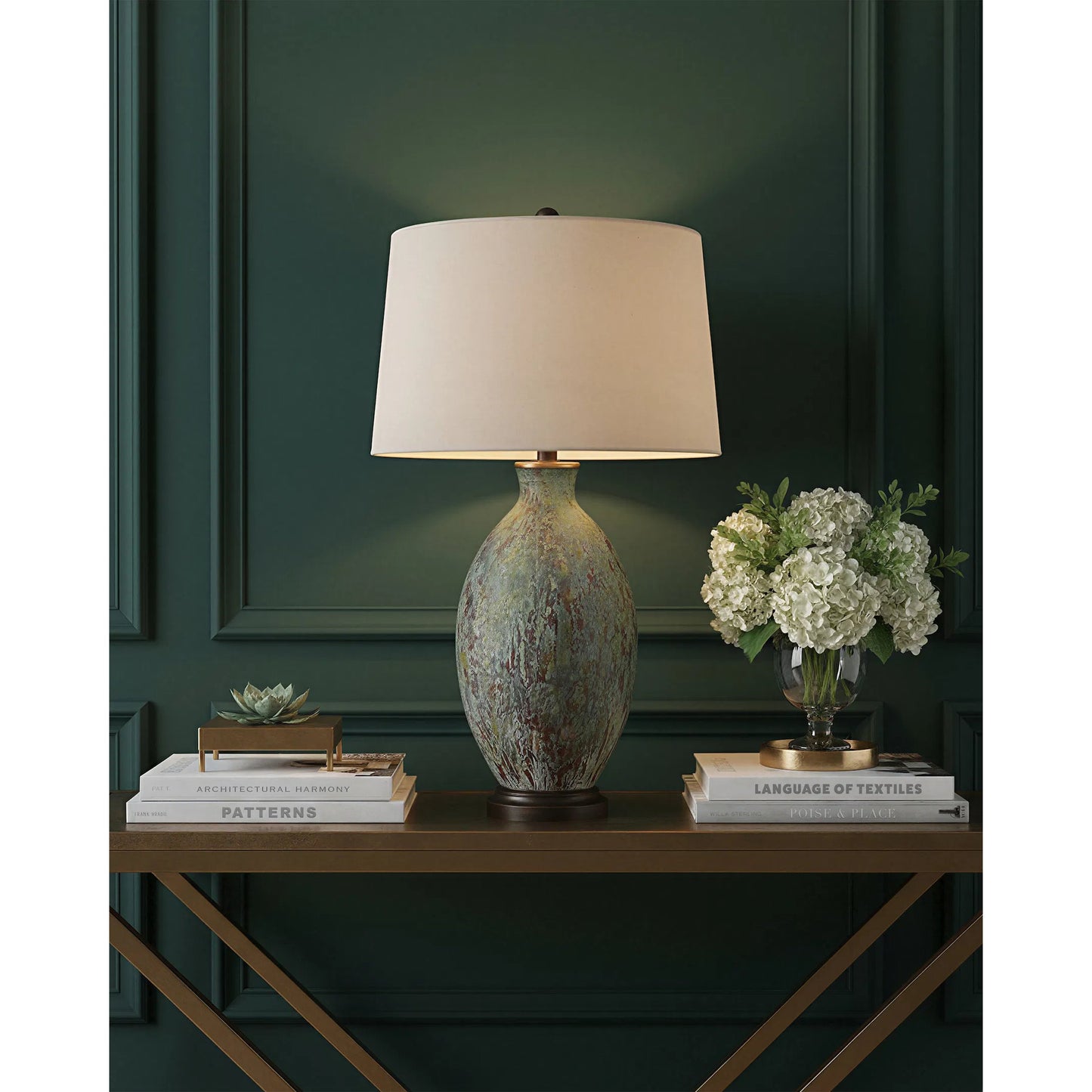005 S-223102 | Lifestyle | Remi Table Lamp by Currey and Company in green, dark red drip glaze, bronze gold. Made from terracotta, wood in a traditional style.