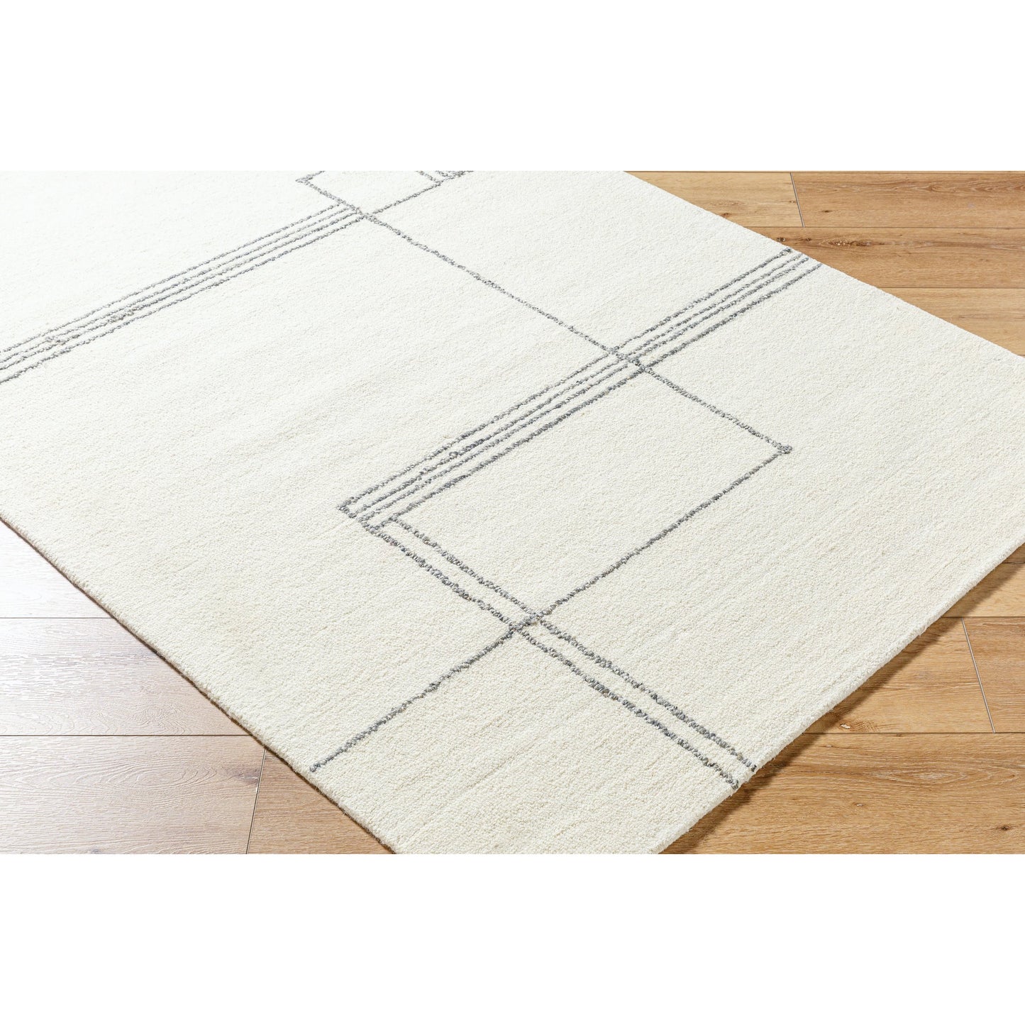 005 SI-2164725,SI-2164726,SI-2164727 | Closeup | Falcao Rug - 530967 by Livabliss in off-white, light silver. Made from wool in a unique style.