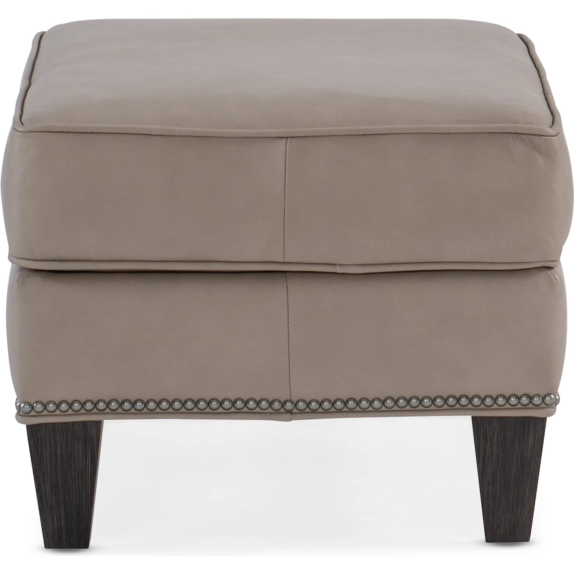 Christopher Ottoman by Bradington-Young by Hooker Furniture in stone. Made from leather in a unique style.
