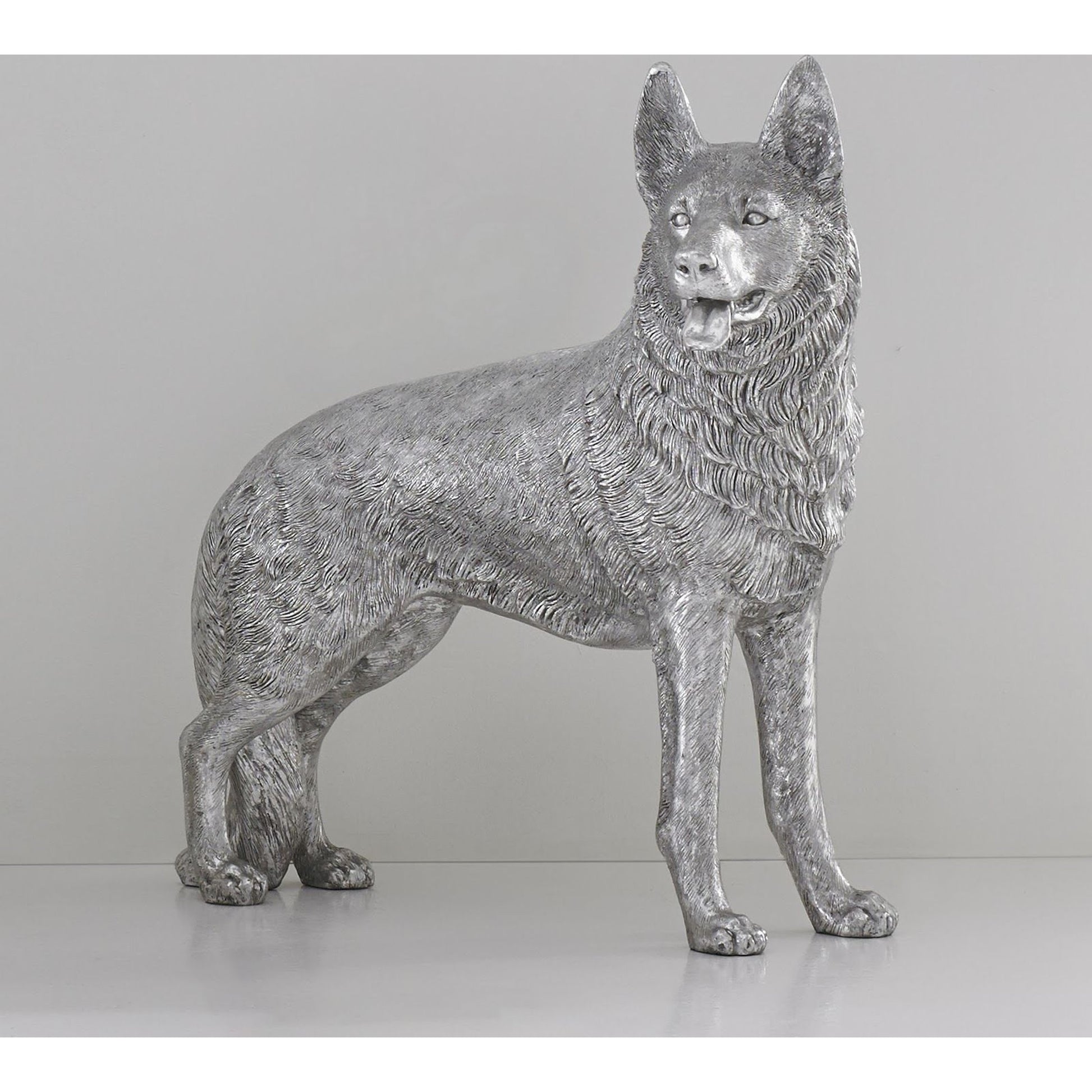 German Shepherd by Phillips Collection in silver and silver leaf. Made from resin in a rustic style.