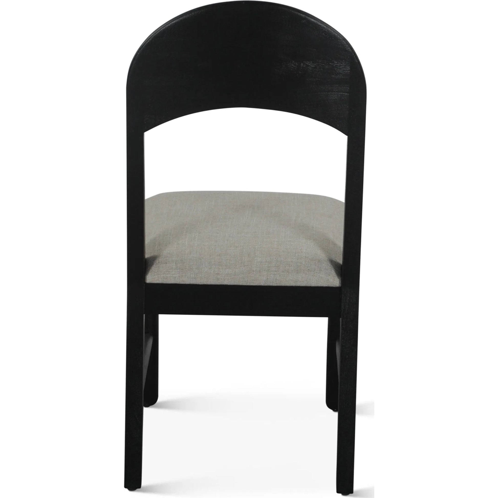 Bakio 18" Upholstered Dining Chair by World Interiors in black and sleek. Made from mango wood in a modern style.