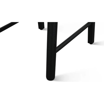 Bakio 18" Upholstered Dining Chair by World Interiors in black and sleek. Made from mango wood in a modern style.