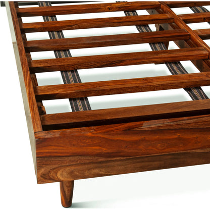 Elliston Reclaimed Wood Bed by World Interiors in brown, black and natural sheesham. Made from reclaimed iron sheesham wood in a transitional style.