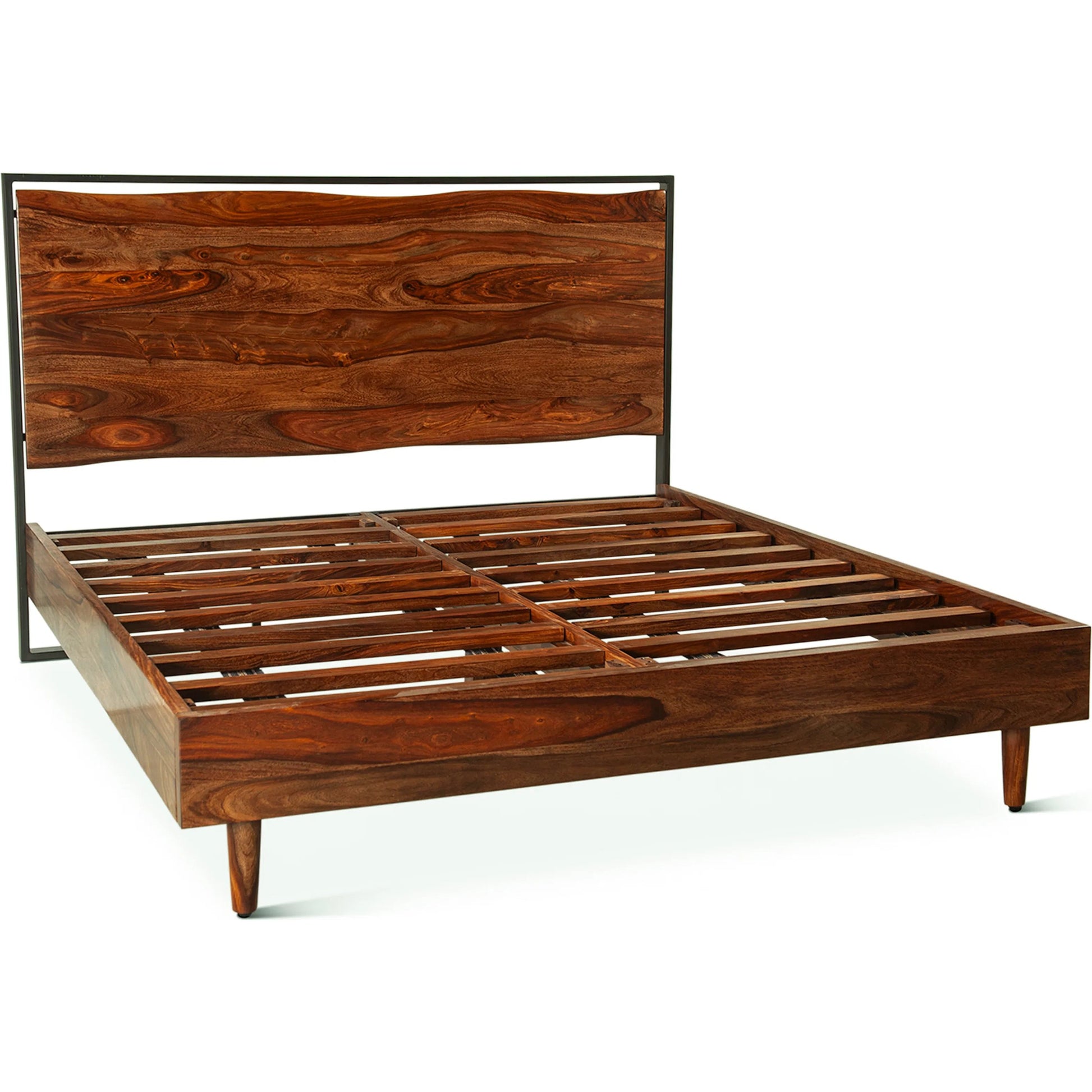 Elliston Reclaimed Wood Bed by World Interiors in brown, black and natural sheesham. Made from reclaimed iron sheesham wood in a transitional style.