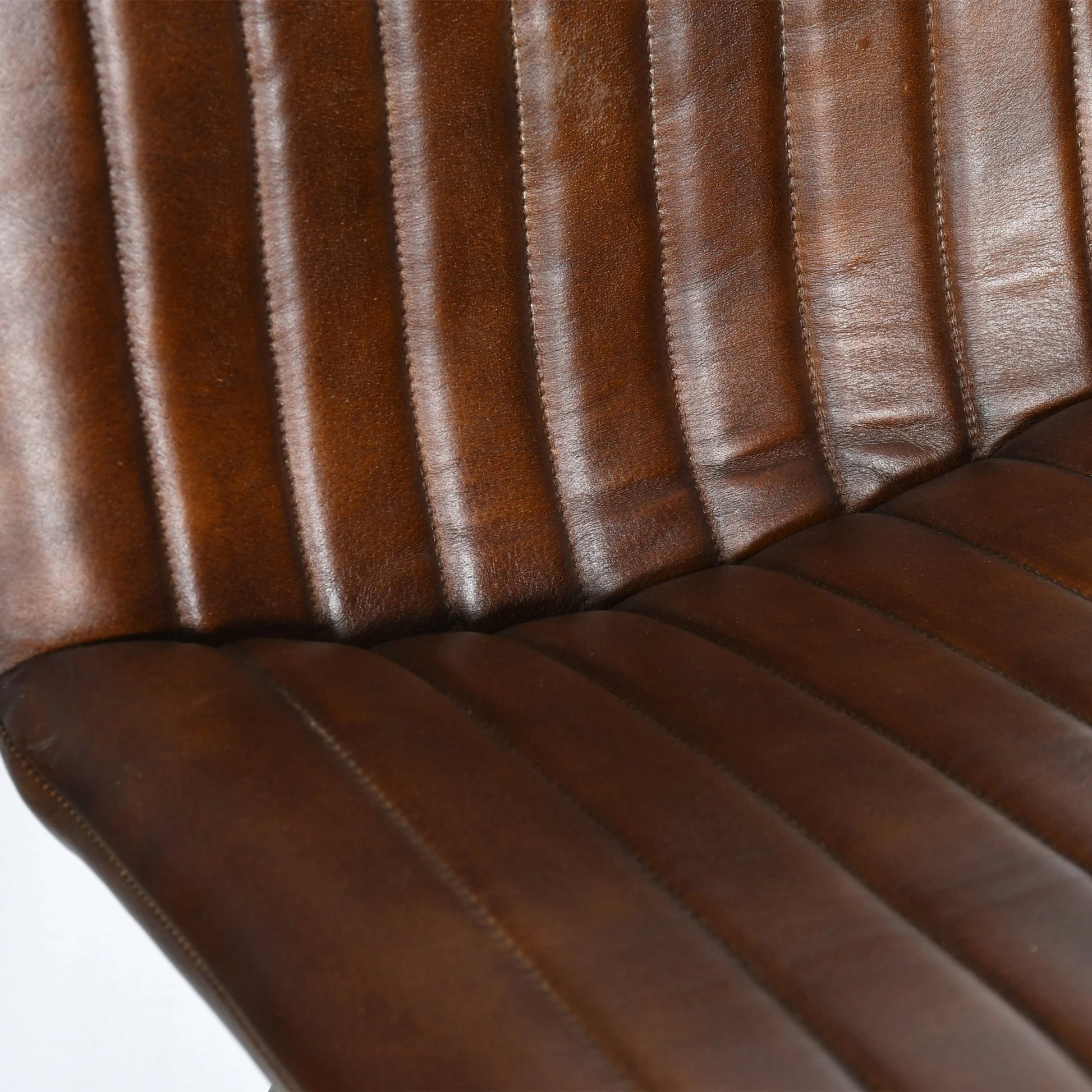 Brisben Vintage Modern Hand Washed Leather Dining Chair by World Interiors. Made from leather, iron in a modern style.