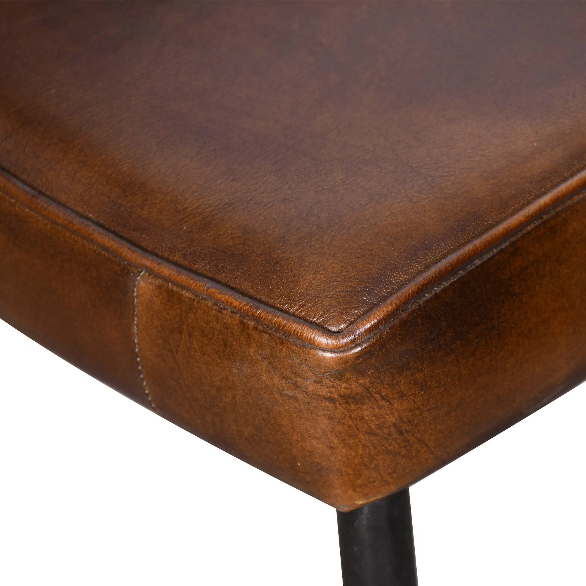 Brisbane Leather Armchair by World Interiors in browns and hand washed. Made from reclaimed iron top, top grain leather in a traditional style.