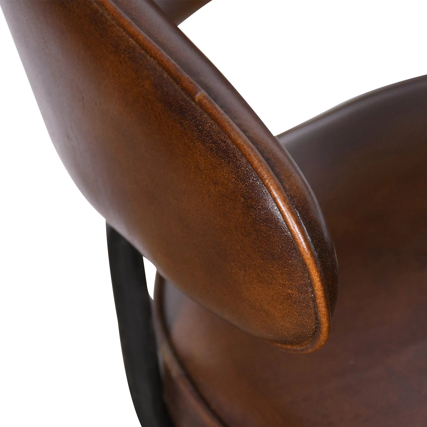 005 SI-2242774 | Closeup | Brisbane Leather Armchair by World Interiors in browns and hand washed. Made from reclaimed iron top, top grain leather in a traditional style.