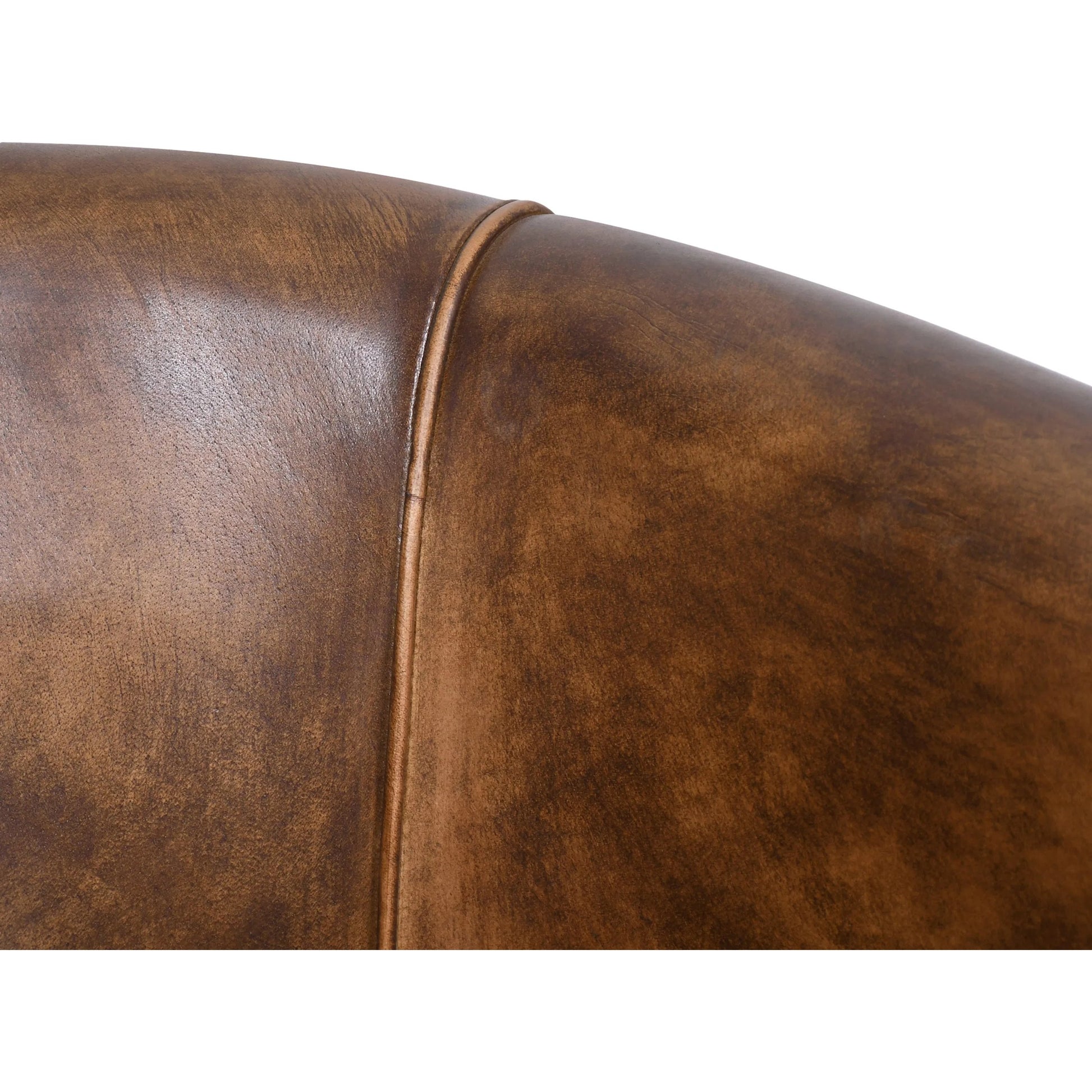 Brisbane Armchair by World Interiors in browns and whiskey. Made from reclaimed iron top, top grain leather in a traditional style.