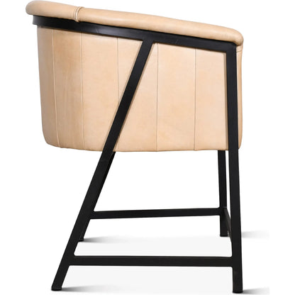 Brisbane Armchair by World Interiors in browns and whiskey. Made from reclaimed iron top, top grain leather in a traditional style.