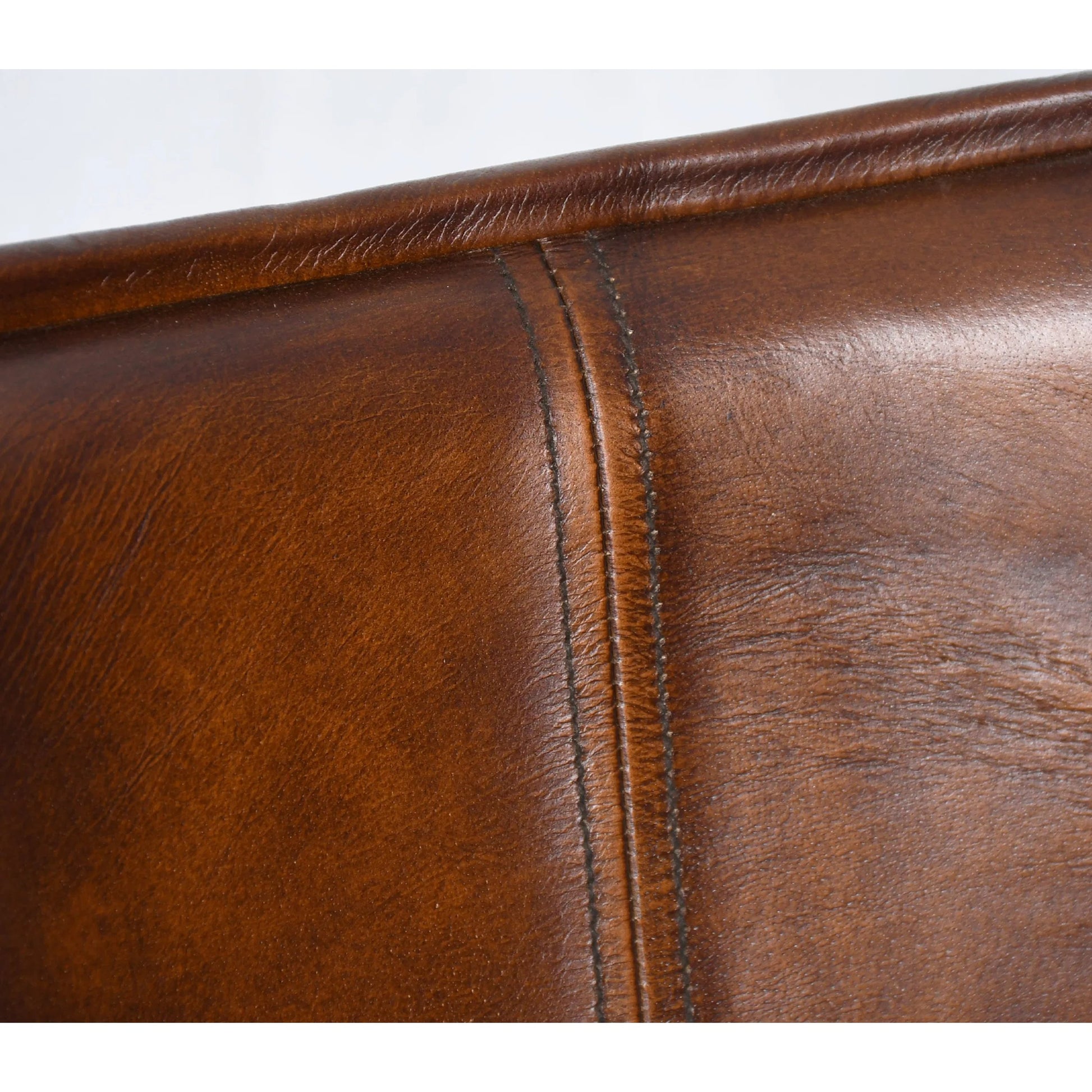 Brisbane Counter Chair by World Interiors in brown and hand washed. Made from reclaimed iron top, top grain leather in a traditional style.