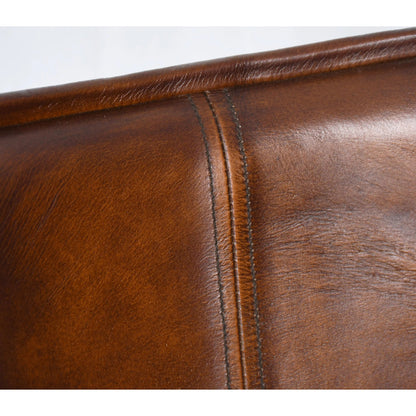 Brisbane Counter Chair by World Interiors in brown and hand washed. Made from reclaimed iron top, top grain leather in a traditional style.