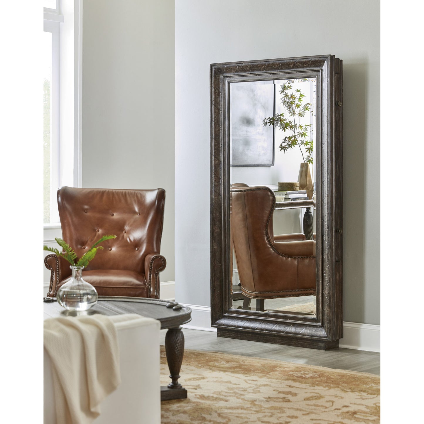 005 SI-1873231 | Lifestyle | Traditions Floor Mirror by Hooker Furniture in dark wood. Made from pine veneers with mirror, felt, copper, jewelry bags in a transitional style.