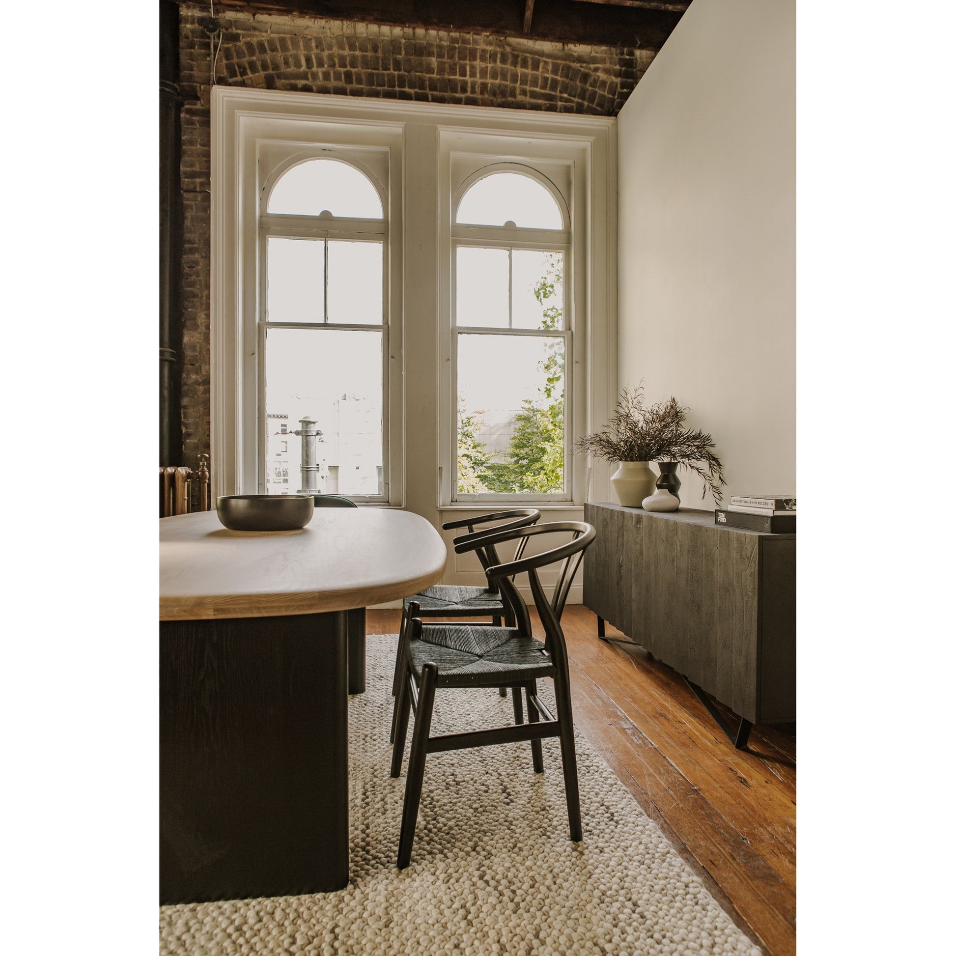 Ventana Dining Chair (Set of 2) by Moe's Home Collection in black frame, natural seat. Made from solid elm frame, woven fibre seat in a transitional style.