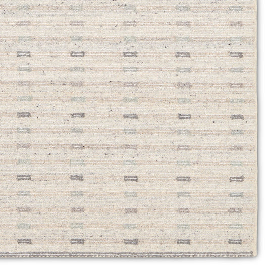 Finnigan FGN01 Rug by Jaipur Living in ivory, taupe, gray. Made from 100% wool in a unique style.