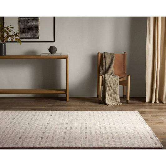 Finnigan FGN01 Rug by Jaipur Living in ivory, taupe, gray. Made from 100% wool in a unique style.
