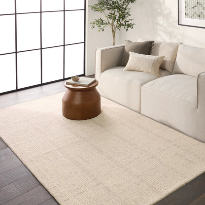 Finnigan FGN02 Rug by Jaipur Living in cream, brown. Made from 100% wool in a unique style.